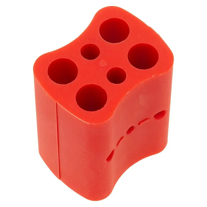Stubai Zubehörsortiment für WoodRepair Sticks - Material: Kunststoff - Roter Silikonblock mit mehreren Löchern und seitlichen Schlitzen zum Ordnen kleiner Gegenstände.