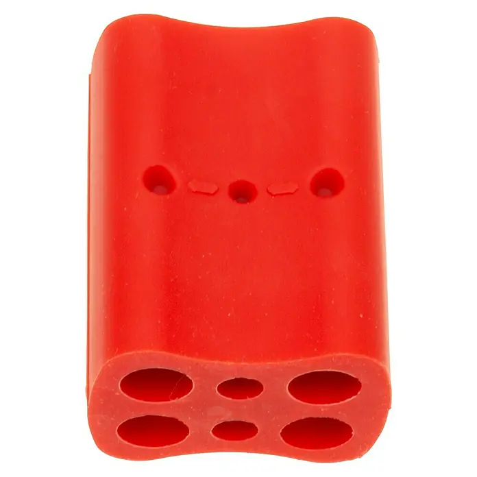 Stubai Zubehörsortiment für WoodRepair Sticks - Material: Kunststoff - Rotes Gummi-Hundekauspielzeug mit mehreren ovalen Leckerli-Löchern.