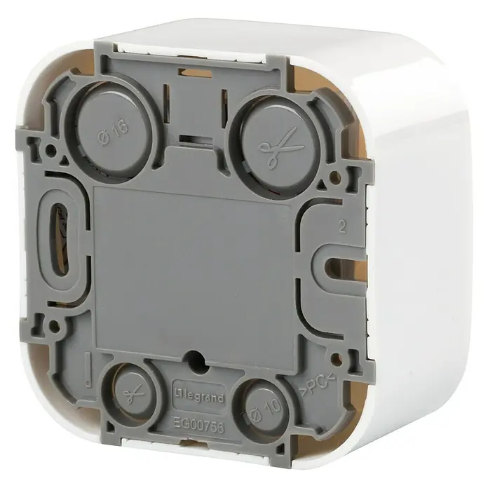 Legrand Forix Toma de red - x 1, Blanco, Montaje en superficie - Primer plano de una caja de empotrar Legrand blanca con parte trasera gris, que presenta varios recortes y marcas.
