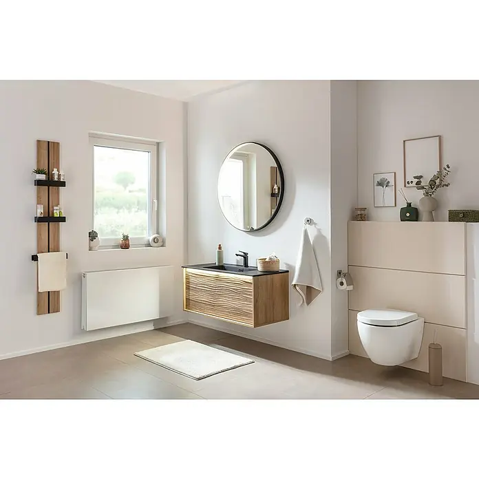 Lanzet Dune Einbauwaschbecken - 101 x 46,5 cm, Schwarz - Ein helles Badezimmer mit einem runden Spiegel über einem modernen Waschtisch und einer Toilette. Das Design ist minimalistisch und elegant.