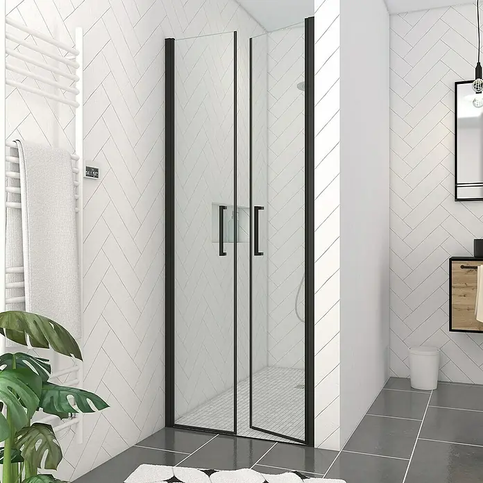 Aurlane Dusch-Pendeltür Saloon - 80 x 200 cm, Schwarz, Beschichtet, Glasstärke: 6 mm - Eine schwarz gerahmte Glas-Faltduschkabine in einem modernen Badezimmer.