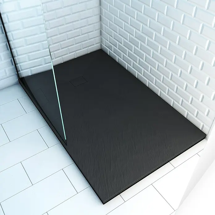 Aurlane Duschwanne Stone - L x B: 140 x 90 cm, High Pressure Tech, Schwarz - Dunkelgraue Duschwanne in Schieferoptik in moderner Dusche mit weißen Fliesen und Glaswand.