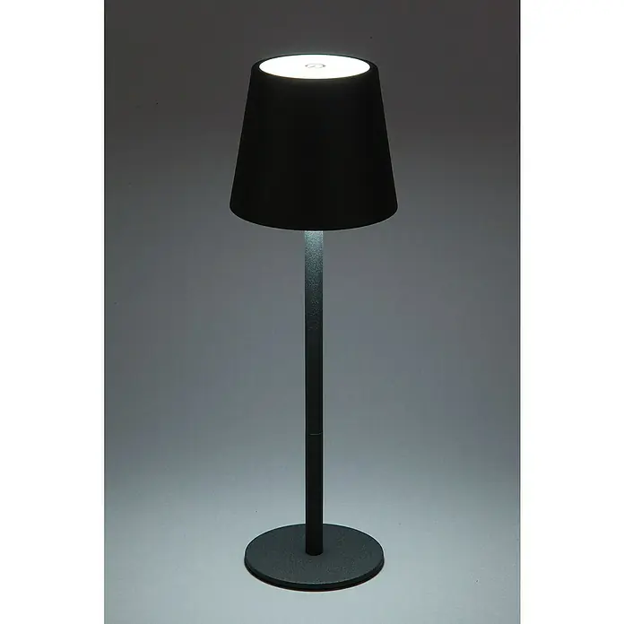 Starlux Paola Akku-Tischleuchte - 3 Stk., 1,6 W, L x B x H: 8,6 x 8,6 x 27 cm, Warmweiß, Schwarz - Nahaufnahme einer eleganten, minimalistischen schwarzen Tischlampe, die ein warmes, einladendes Licht ausstrahlt.