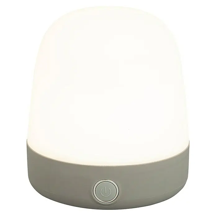 Starlux Akku-Tischleuchte Mini - L x B x H: 10 x 10 x 12 cm, Light Grey, RGBW, 0,3 W, IP44 - Nahaufnahme einer Nachttischlampe mit grauer Basis und rundem, hellem Schirm, die ein sanftes Licht ausstrahlt.
