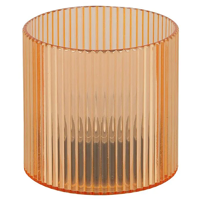 BAUHAUS Solar-Dekoleuchte Teelicht - 0,6 W, Mango, IP44 - Nahaufnahme einer gerippten, orangefarbenen Vase. Perfekt als dekoratives Element für jeden Raum.