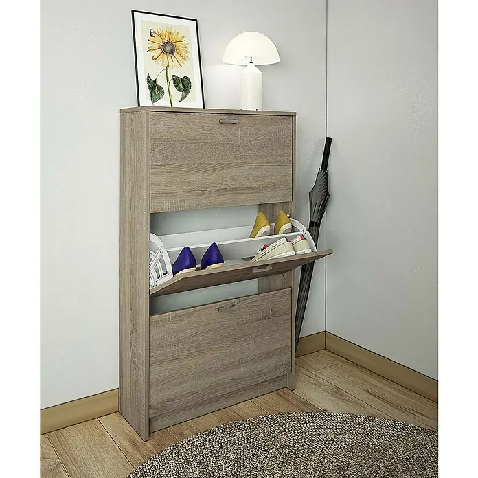 Meka Block Zapatero K-30 - L x An x Al: 25 x 70 x 120 cm, Roble Cortez, Número de compartimentos: 3 ud. - Zapatero moderno de madera con dos compartimentos y elementos decorativos. El armario ofrece espacio para zapatos y otros artículos.