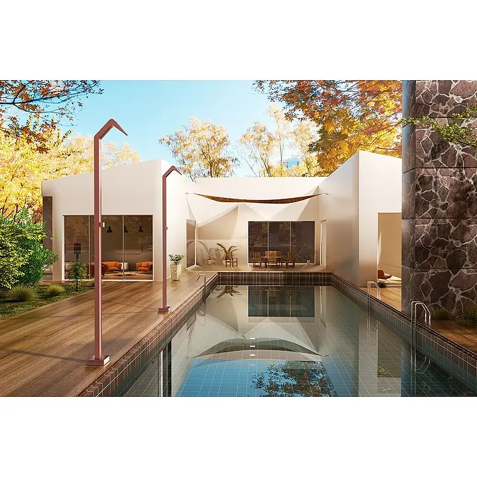 Imex Poolimex Ducha de piscina Niagara - 218 cm, Acero inoxidable, Rosa coral - Toma exterior de una piscina con duchas elegantes, rodeada de arquitectura moderna y naturaleza otoñal.