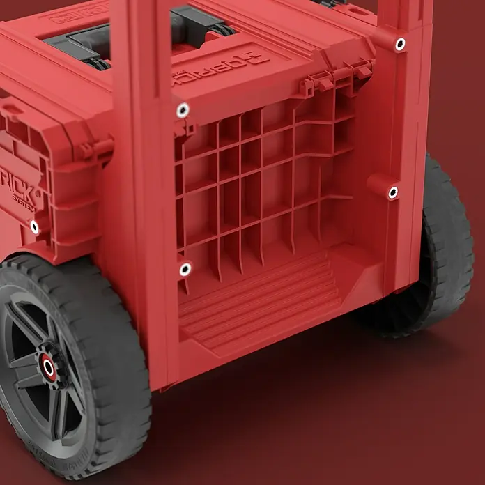 Qbrick System Systemkoffer Pro 2.0 Plus - L x B x H: 49 x 41,5 x 66 cm, Polypropylen - Rote rollbare Werkzeugkiste aus Kunststoff mit sichtbarem Griffmechanismus und texturierter Innenseite.
