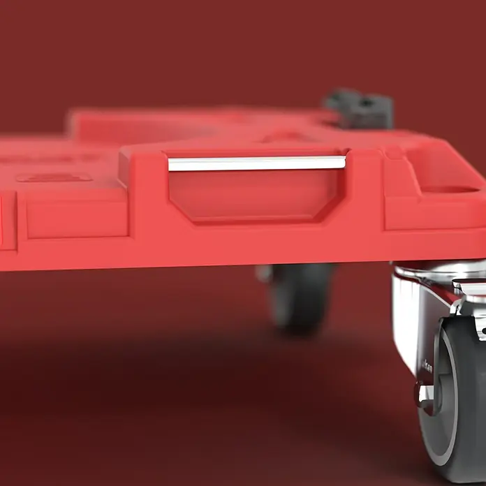 Qbrick System Transportroller Pro - L x B x H: 51 x 32,8 x 14,5 cm, Traglast: 100 kg - Nahaufnahme einer roten Kunststoff-Transportplattform mit silbernem Griffeinsatz und Lenkrolle.