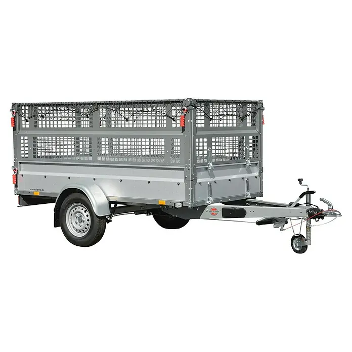 Stema Anhänger Basic STL 1300-25-13.1 mit Gitteraufsatz - Nutzlast: 960 kg, Gebremst - Ein silberfarbener Stema Anhänger mit Gitteraufsatz, ideal für den Transport von Gartenabfällen oder Baumaterialien. Robuster und vielseitiger Anhänger.