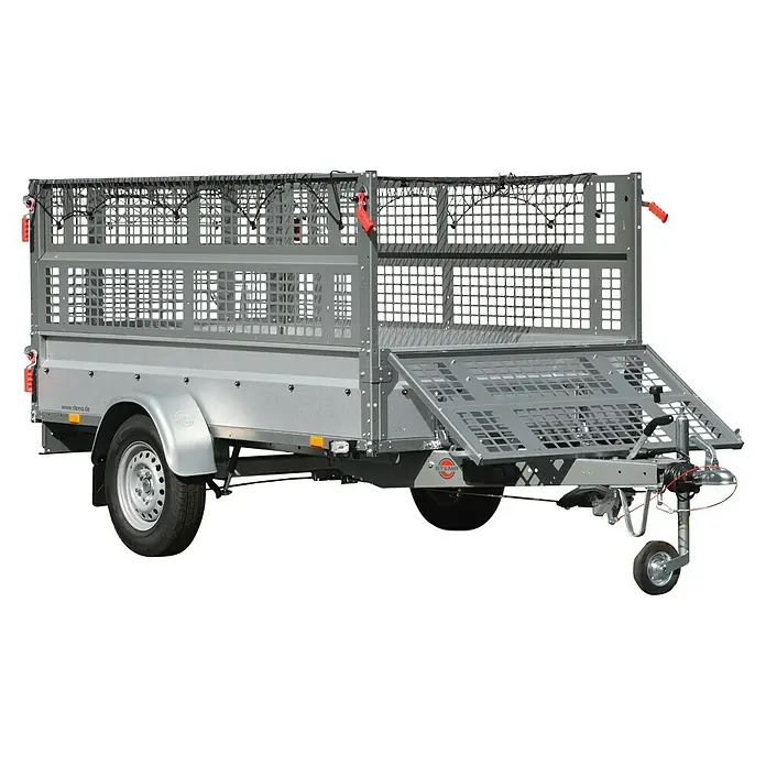 Stema Anhänger Basic STL 1300-25-13.1 mit Gitteraufsatz - Nutzlast: 960 kg, Gebremst - Ansicht eines silbernen Anhängers mit Gitteraufsatz und offener Ladeklappe. Das stabile Design ist ideal für den Transport von sperrigen Gütern.