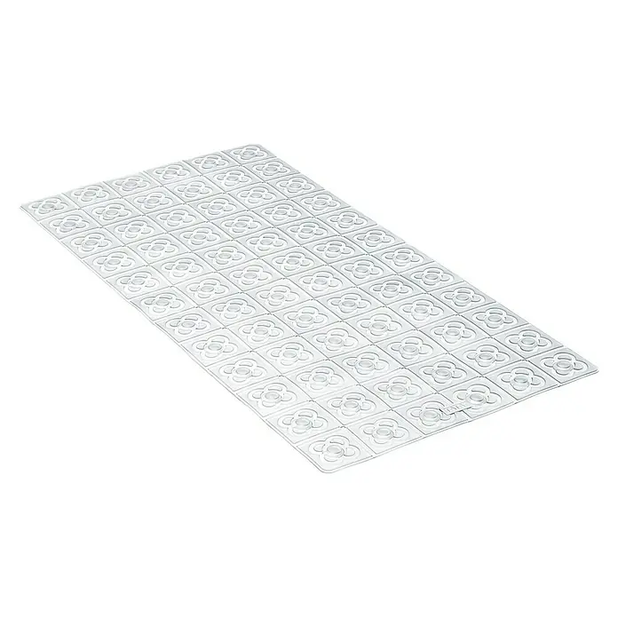 Tatay Alfombra antideslizante para ducha BCN - 36 x 72 cm, PVC, Translúcido - La imagen muestra una baldosa blanca rectangular de Barcelona con un patrón floral repetido, ideal para superficies decorativas.