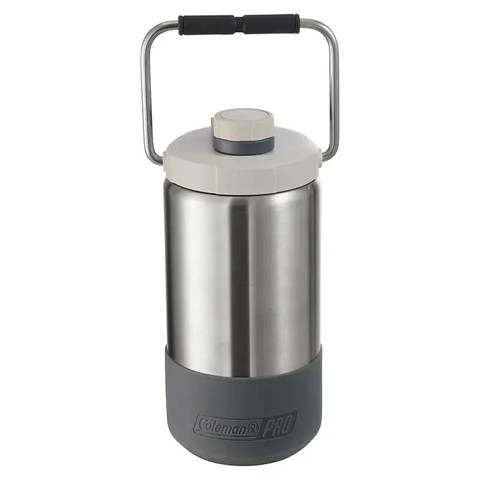 Coleman Termo Jug Pro - 1,8 l, Silicona - Un recipiente para bebidas Coleman Pro de acero inoxidable con base y asa grises. Ideal para llevar contigo y mantiene las bebidas frías.