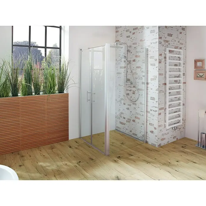 Camargue Vario Duschwand für Doppelpendeltür S37 - B x H: 90 x 195 cm, Beschichtet, Silber - Bild einer modernen Duschkabine mit klaren Glaswänden und einem schlanken Rahmen, vor einer Ziegelwand und einem stilvollen Heizkörper.