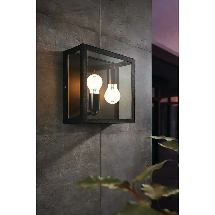 Eglo Aplique exterior Alamonte - 60 W, 13 x 29 x 29 cm, Negro, IP44 - Luminaria moderna de exterior con cristal transparente y dos bombillas Edison, que proyecta una luz cálida en la pared.