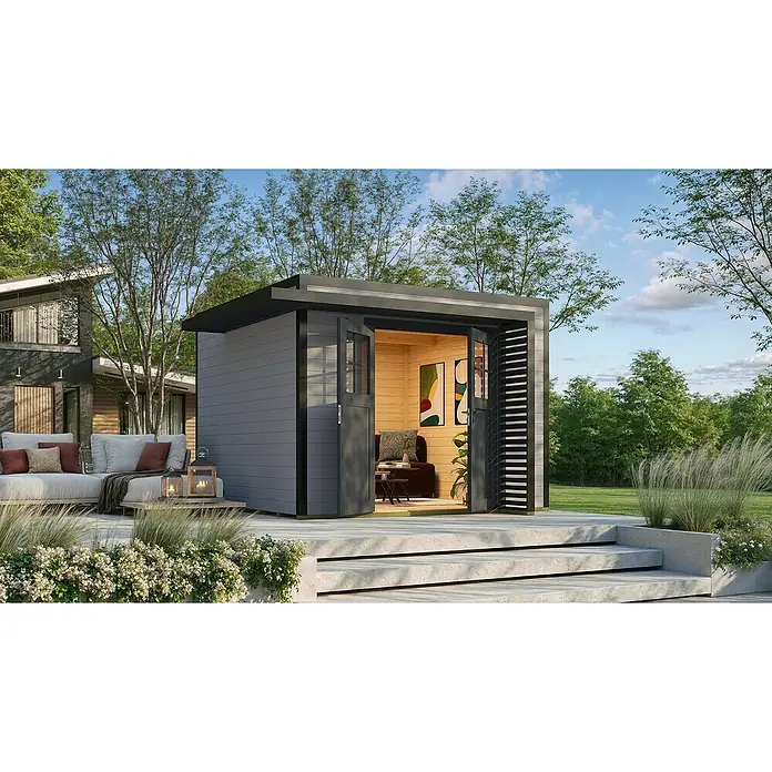 Weka Gartenhaus Pure Garden Amberley - Außenmaß inkl. Dachüberstand (B x T): 350 x 353 cm, Holz, Grau/Anthrazit, Ohne Fenster - Modernes dunkelgraues Gartenbüro mit Holzinterieur und Bi-Fold-Türen, auf einer Terrasse im Garten.