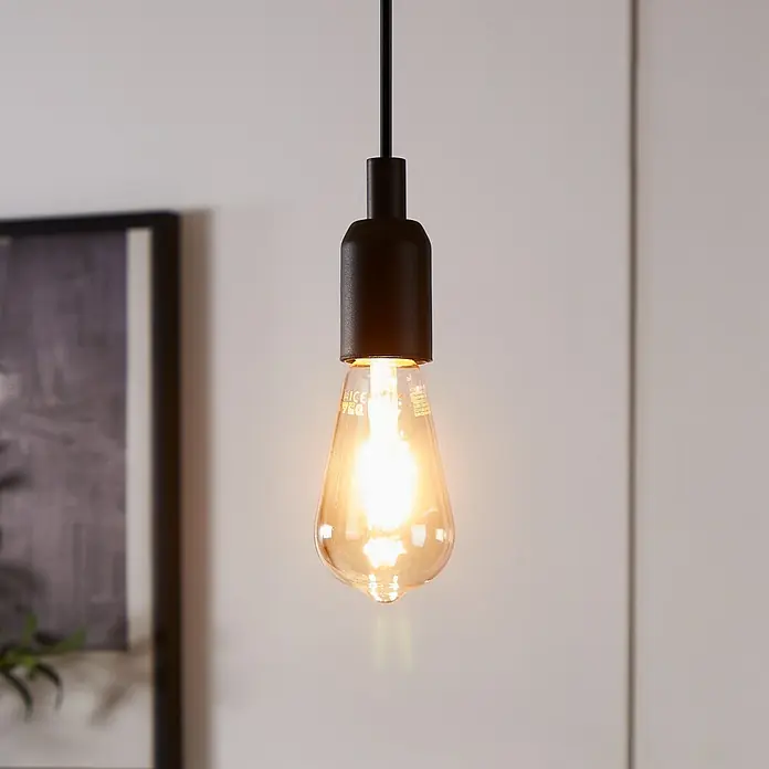 Eglo connect.z Smart-LED-Lampe Zigbee CCT - E27, Dimmbar, Warmweiß, 400 lm, 4,9 W - Nahaufnahme einer stilvollen Pendelleuchte mit einer dekorativen Glühbirne, die warmes Licht ausstrahlt und eine gemütliche Atmosphäre schafft.