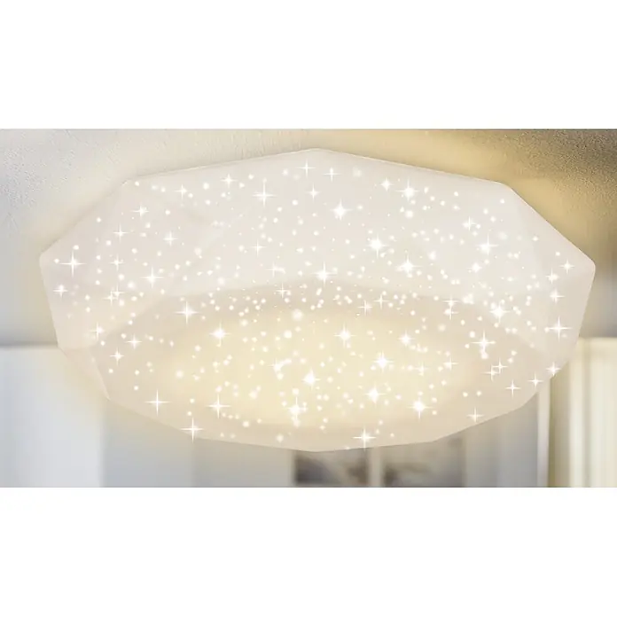 Lavida LED-Deckenleuchte rund Casoli - 18 W, Ø x H: 350 mm x 9 cm, Weiß - Nahaufnahme einer Deckenleuchte mit Sternenmuster, die ein warmes, gemütliches Licht ausstrahlt und eine entspannende Atmosphäre schafft.