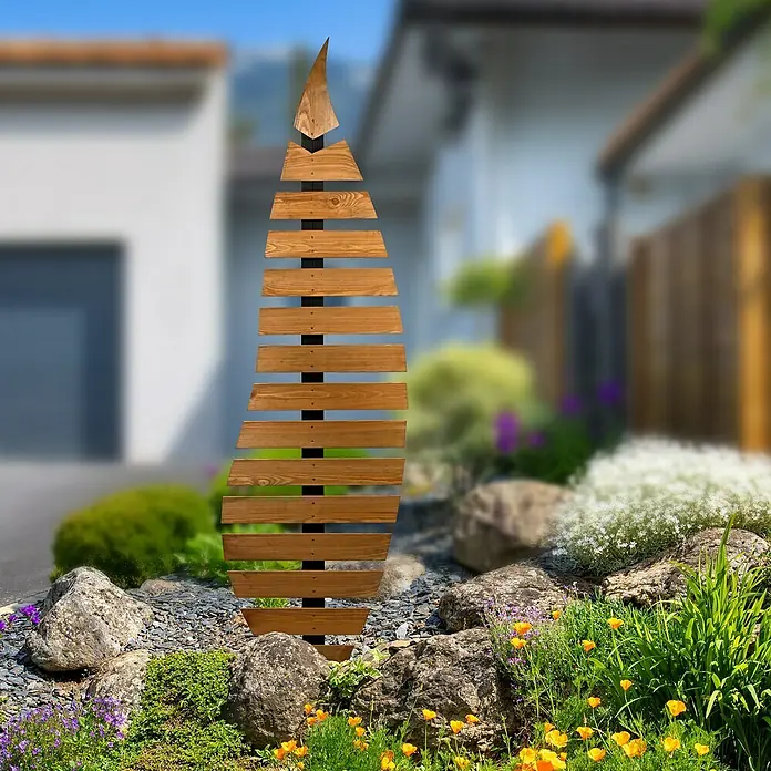Dobar Rankhilfe Abstractus - B x H: 6 x 197 cm, Metall - Gartenbildschirm aus Holzlatten auf einem Metallrahmen, umgeben von Steinen und Pflanzen. Der Zaun bietet Privatsphäre und ist dekorativ.