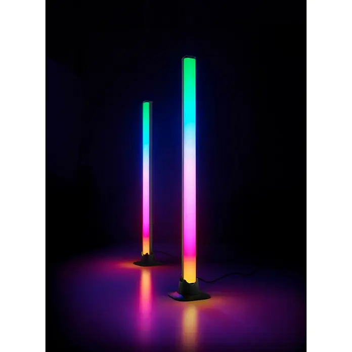 Trio Lighting Lámpara de sobremesa Boy - 2 ud., 5 W, RGBW - Dos luces de ambiente LED con degradados de color que proyectan una luz colorida y atmosférica en el suelo.