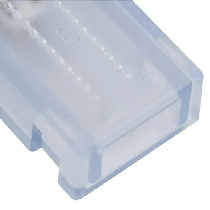 Alverlamp Conector en L Neon - An x L: 5,85 x 5,85 cm, Transparente - Primer plano de un contenedor de plástico rectangular transparente, posiblemente una carcasa protectora o una carcasa para componentes electrónicos.