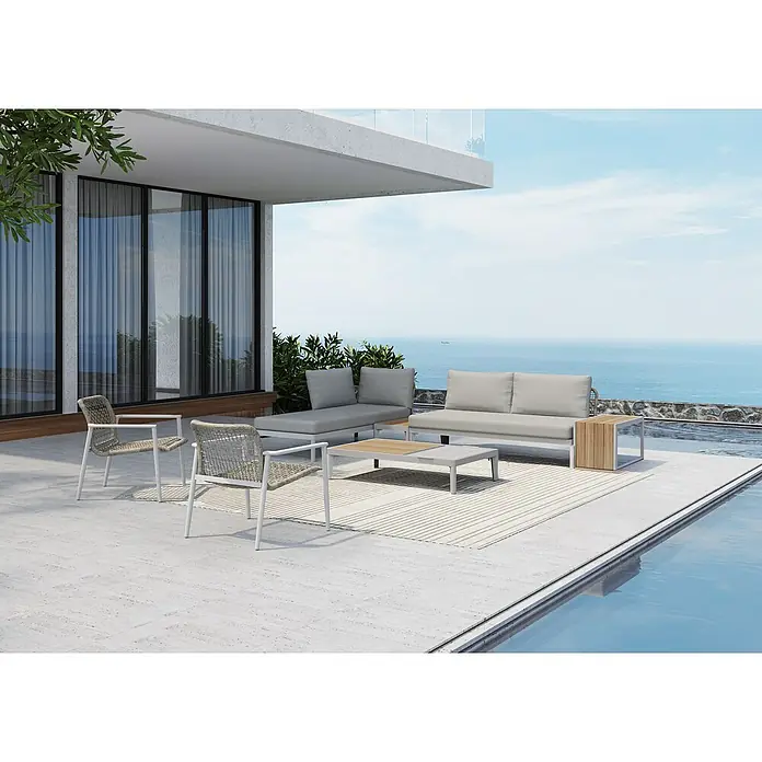 Sunfun Loungemöbel-Set Solo Rope - 7 -tlg., Aluminium/Polyrattan/Olefin, Light-Greige - Einladende Lounge-Möbel im Freien mit Sofa, Sesseln und Beistelltisch auf einer Terrasse mit Meerblick.