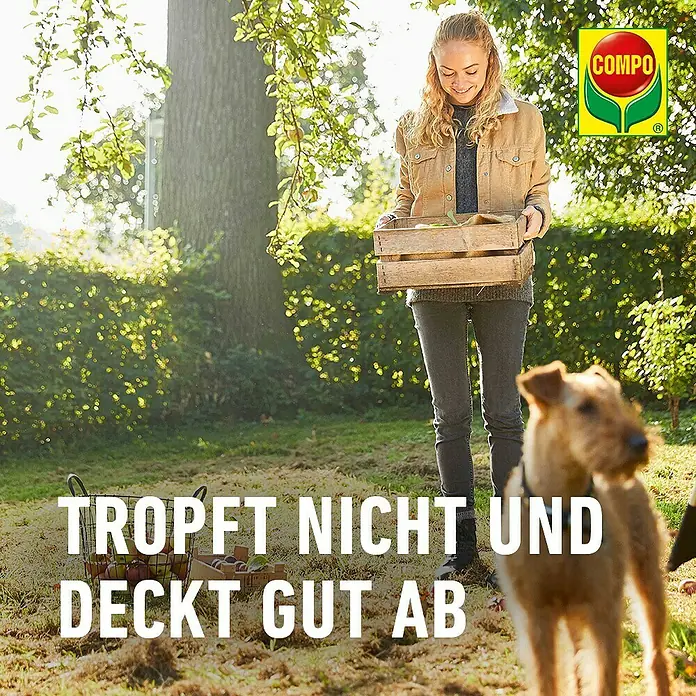 Compo Bio-Wundbalsam Lac Balsam® - 385 g - COMPO Produkt: tropft nicht & deckt gut ab. Frau mit Ernte im Garten, Hund im Vordergrund.