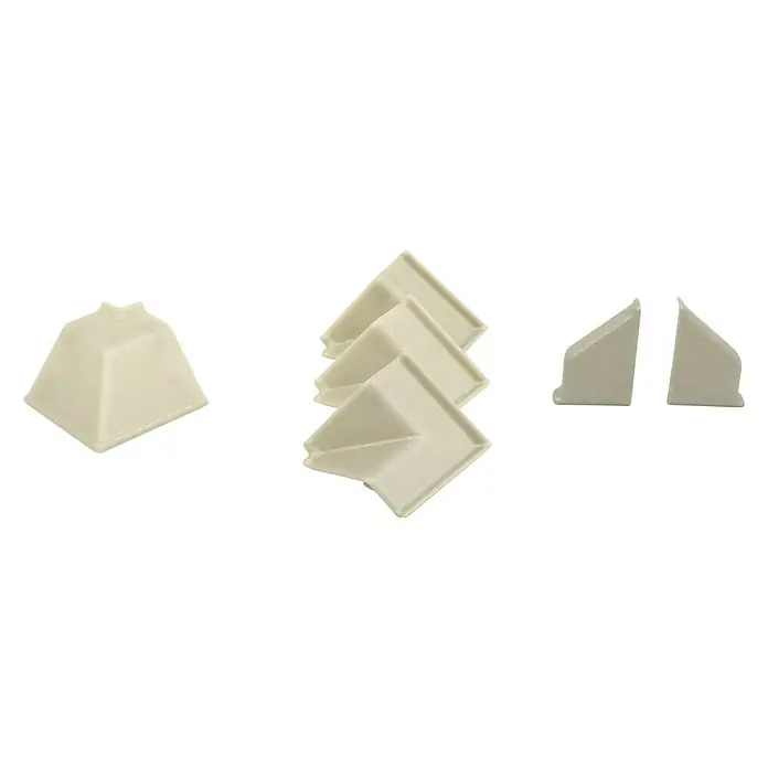 CUCINE Zubehör-Set gedreht - Gold, 6 -tlg. - Eine Nahaufnahme von einer Sammlung aus cremefarbenen Eckenschützern, die zum Schutz von Ecken verwendet werden.