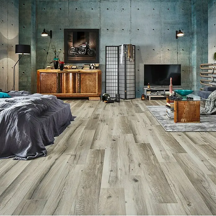 MyStyle MyDream Laminat - Wilderness Oak, Landhausdiele, 1.285 x 192 x 14 mm - Moderne Schlafzimmergestaltung mit grauem Holzboden, der dem Raum ein stilvolles und gemütliches Ambiente verleiht.