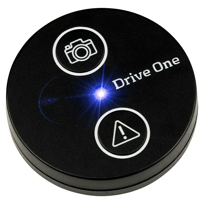 Needit Drive One - Mit Batterien - Schwarzes rundes Drive One Gerät mit blauem Licht und weißen Kamera- sowie Warnsymbolen.
