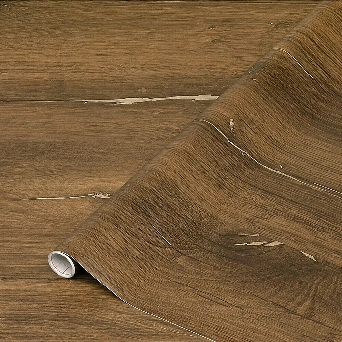 D-c-fix Rollo adhesivo vinílico Roble Asta - 200 x 45 cm, Roble, Autoadhesivo - Primer plano de un rollo de papel de contacto con vetas de madera marrón desenrollándose, mostrando un aspecto de madera realista.