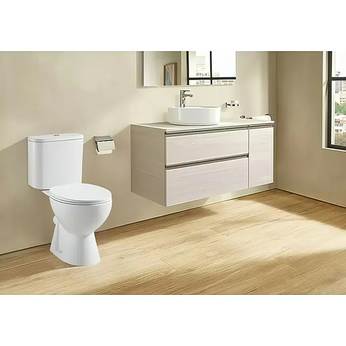 Pack de WC Tampa - Con borde de descarga, Salida WC: Horizontal, Blanco - Un baño luminoso con un inodoro moderno y un mueble de baño con un lavabo sobre encimera blanco.