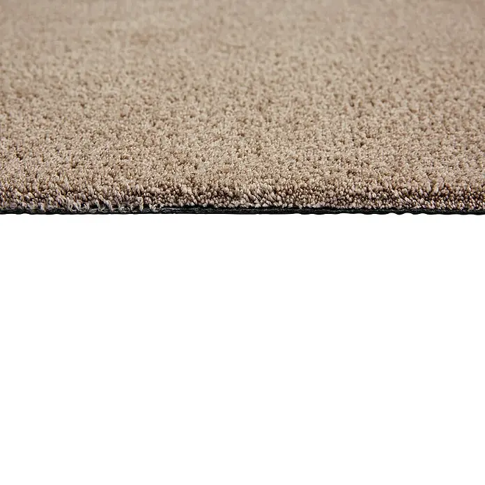 Fußmatte Moon - Taupe, 100 x 60 cm, 100 % Polyester - Nahaufnahme eines beigen Teppichs.