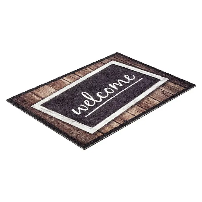 Astra Deco Fußmatte Brush - Schwarz/Braun/Grau, 50 x 70 cm - Eine rechteckige Fußmatte mit der Aufschrift "Willkommen" in weißer Schrift auf einem dunklen Hintergrund. Der Rand ist in Holzoptik gestaltet.
