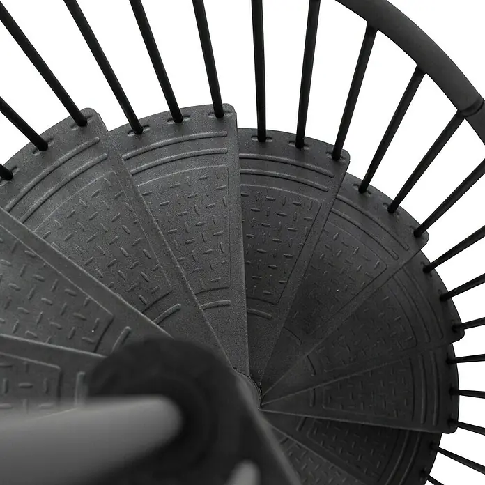 Minka Spindeltreppe Rondo Color - Durchmesser: 160 cm, Anthrazit, Geschosshöhe: 300 cm - Detailaufnahme einer eleganten, grauen Wendeltreppe mit Geländer. Das robuste Design und die spiralförmige Form machen die Treppe zu einem Hingucker.