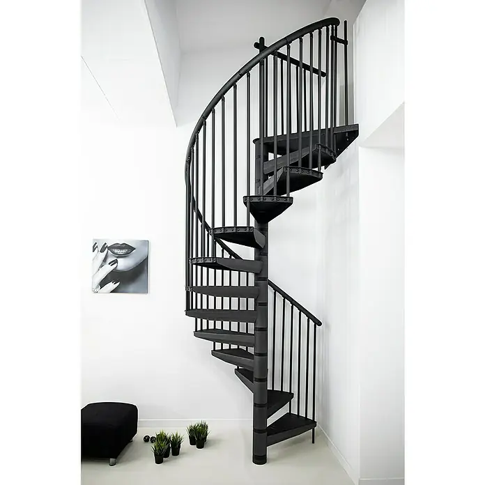 Minka Spindeltreppe Rondo Color - Durchmesser: 160 cm, Anthrazit, Geschosshöhe: 300 cm - Schwarze Wendeltreppe mit schwarzen Geländern und Stufen in einem hellen Raum. Ein modernes und stilvolles Designelement.