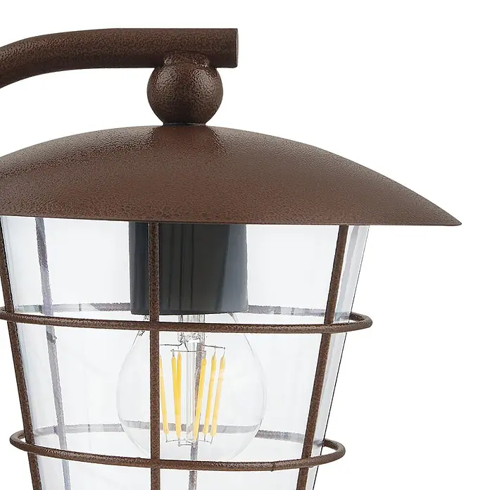Eglo Außenwandleuchte Pulfero 1 - 60 W, Braun, Klar, IP44 - Nahaufnahme einer rustikalen Außenleuchte mit Glühbirne, ideal für stimmungsvolle Beleuchtung im Garten oder auf der Terrasse.