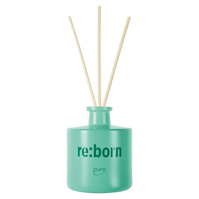 Ipuro Raumduft We Are - Reborn, 100 ml - Minzgrüner Raumduft-Diffusor mit „re:born“ und „ipuro“ Logo, mit drei natürlichen Holzstäbchen.