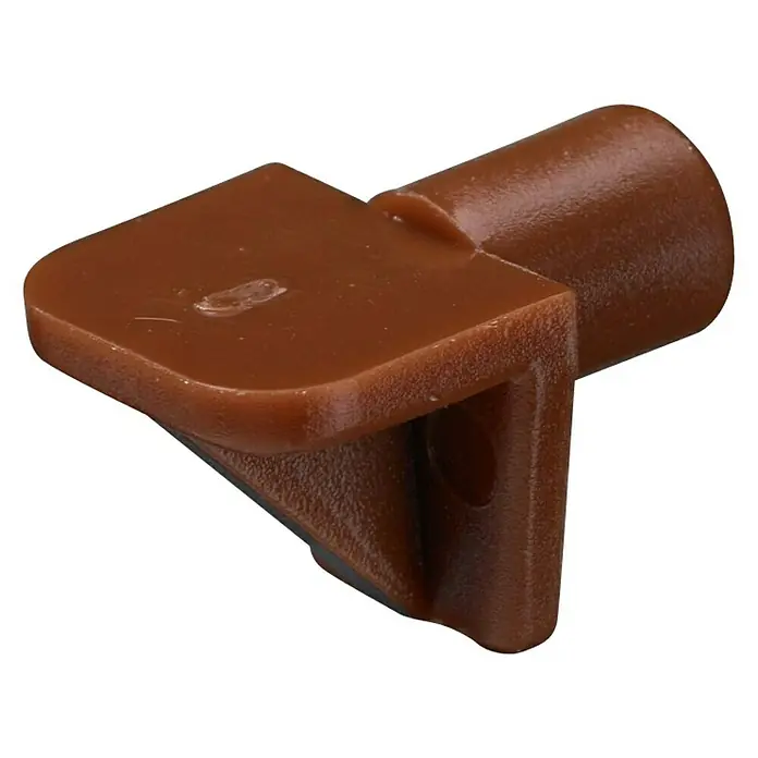 Stabilit Soporte para estantes - 6 mm, Marrón, 40 ud. - Primer plano de un soporte de estante de plástico marrón para instalar estantes en muebles.