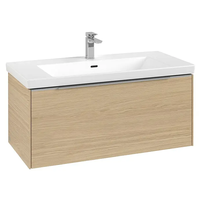 Villeroy & Boch Subway 3.0 Waschbeckenunterschrank - Nordik Oak, Anzahl Schubladen: 1 Stk., Farbe Griff: Aluminium glänzend, B x T x H: 97,3 x 47,8 x 42,9 cm, Mit Beleuchtung - Waschbecken aus weißer Keramik mit Chromarmatur auf hellbraunem Waschtischunterschrank.