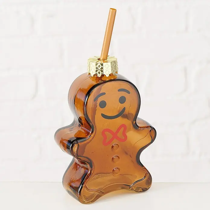 Boltze Trinkglas Lebkuchenmännchen - Braun, L x B x H: 4,7 x 10 x 14,5 cm, Lebkuchen - Bernsteinfarbener Lebkuchenmann-Trinkbecher aus Glas mit bernsteinfarbenem Strohhalm, goldenem Zierverschluss, lächelndem Gesicht, roter Fliege und Knöpfen.