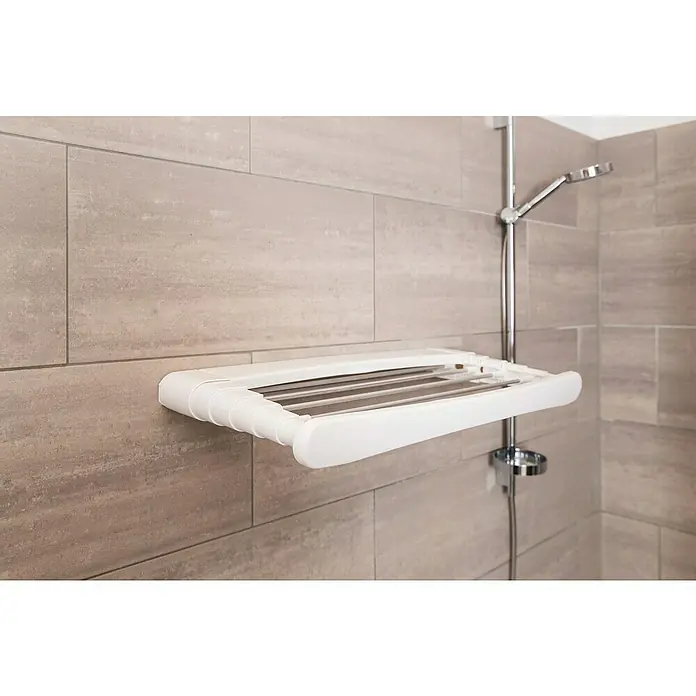 Vileda Wandwäschetrockner Genius 70 - Länge Wäscheleine: 5 m, Farbe: Weiß - Nahaufnahme einer weißen, wandmontierten Wäschespinne im Badezimmer, die eine praktische Lösung zum Trocknen von Kleidung bietet.