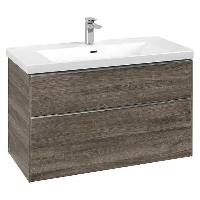 Villeroy & Boch Subway 3.0 Waschbeckenunterschrank - Stone Oak, Anzahl Schubladen: 2 Stk., Farbe Griff: Aluminium glänzend, B x T x H: 97,3 x 47,8 x 57,6 cm, Mit Beleuchtung - Dunkle Holzmaserung Badezimmermöbel mit zwei Schubladen, weißem Keramikwaschbecken und Chromarmatur.