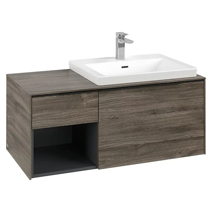 Villeroy & Boch Subway 3.0 Waschbeckenunterschrank - Stone Oak, Anzahl Schubladen: 2 Stk., Farbe Griff: Volcano Black, B x T x H: 100,1 x 51,6 x 42,3 cm, Mit Beleuchtung, Offenes Fach links - Badmöbel in dunkler Holzoptik mit weißem Keramikwaschbecken und Chromarmatur.