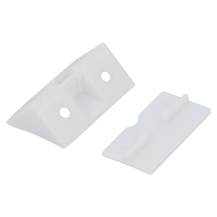 Eckverbinder - 21 x 44 x 21 mm, Weiß - Nahaufnahme von zwei weißen Kunststoff-Eckverbindern, die zur Befestigung und Stabilisierung von Möbeln oder anderen Konstruktionen dienen.