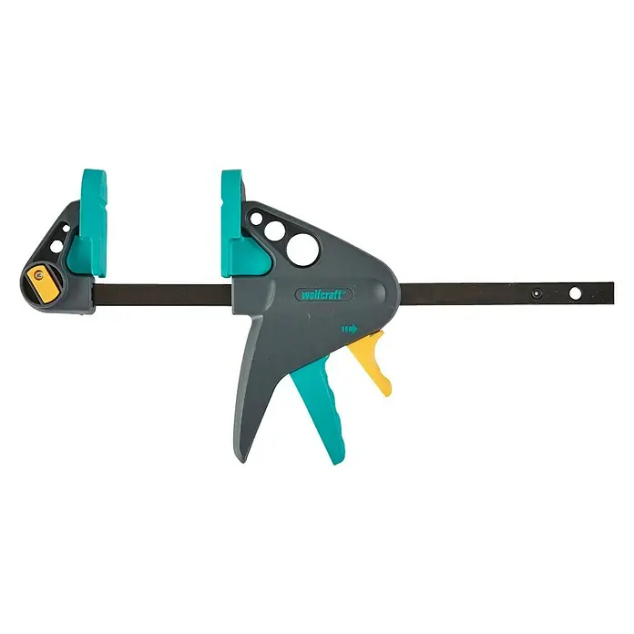 Wolfcraft Tornillo de apriete monomanual EHZ PRO - Anchura de sujeción: 150 mm, Fuerza de tensión: 900 N, Apertura máxima: 65 mm - Sargento de una mano Wolfcraft con mango gris y detalles azules. La herramienta está aislada sobre un fondo blanco.