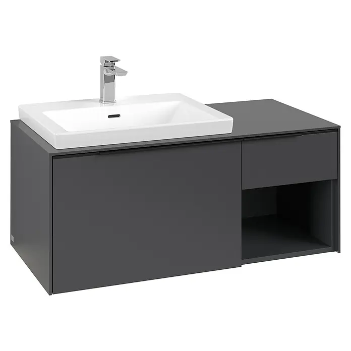 Villeroy & Boch Subway 3.0 Waschbeckenunterschrank - Graphite, Anzahl Schubladen: 2 Stk., Farbe Griff: Volcano Black, B x T x H: 100,1 x 51,6 x 42,3 cm, Mit Beleuchtung, Offenes Fach rechts - Dunkelgrauer Badunterschrank mit weißem Keramikwaschbecken und Chromarmatur.