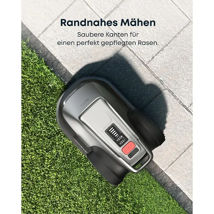 Eufy Mähroboter-Set E18 inkl. Garage - 1.200 m², Schnittbreite: 20,3 cm, Kamera-gestützte Navigation, GPS - Bild eines Rasenmähroboters, der die Rasenkanten präzise schneidet. Saubere Kanten für einen perfekt gepflegten Rasen.