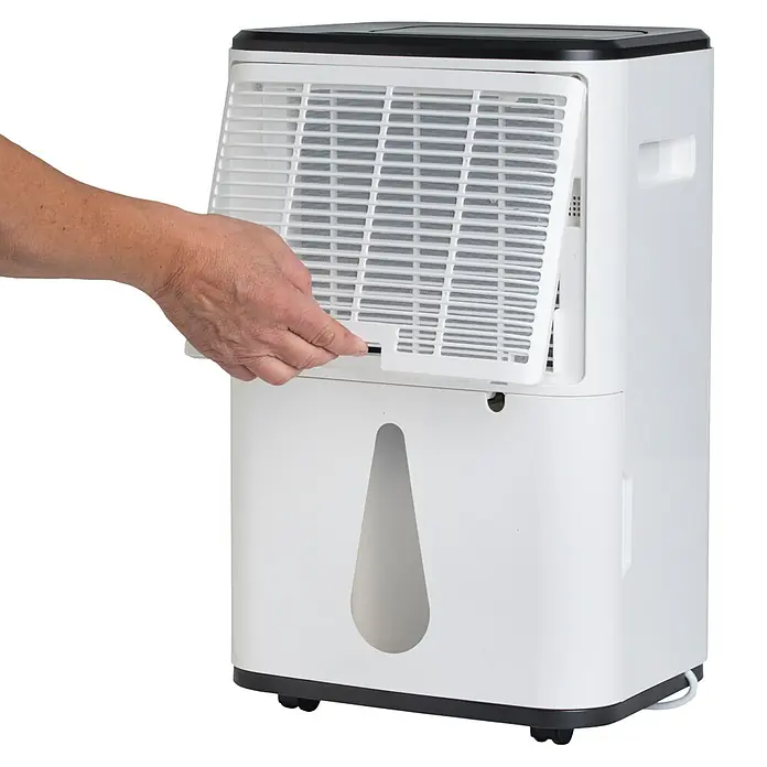Woods Elektro-Luftentfeuchter MDX 20P - 360 W, Entfeuchtungsleistung: 20 l/Tag, Weiß - Weiß-schwarzer Luftentfeuchter; eine Hand öffnet den Luftfilterdeckel.