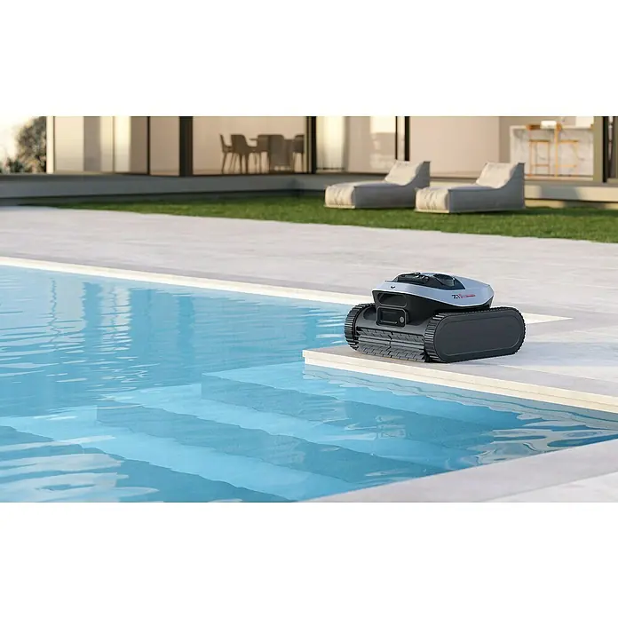 Dreame Poolroboter Z1 Pro - Akkubetrieben, Passend für: Pools bis 200 m² Grundfläche, Filterleistung: 30.000 l/h - Grauer und schwarzer Roboter-Poolreiniger mit Ketten, bereit am Beckenrand eines Schwimmbades.